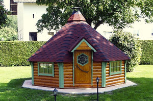 wooden barbecue hut at summer time